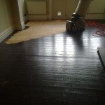 Paint stripping floor boards