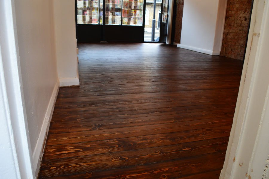 Mid oak stain applied to sanded floors in Angel